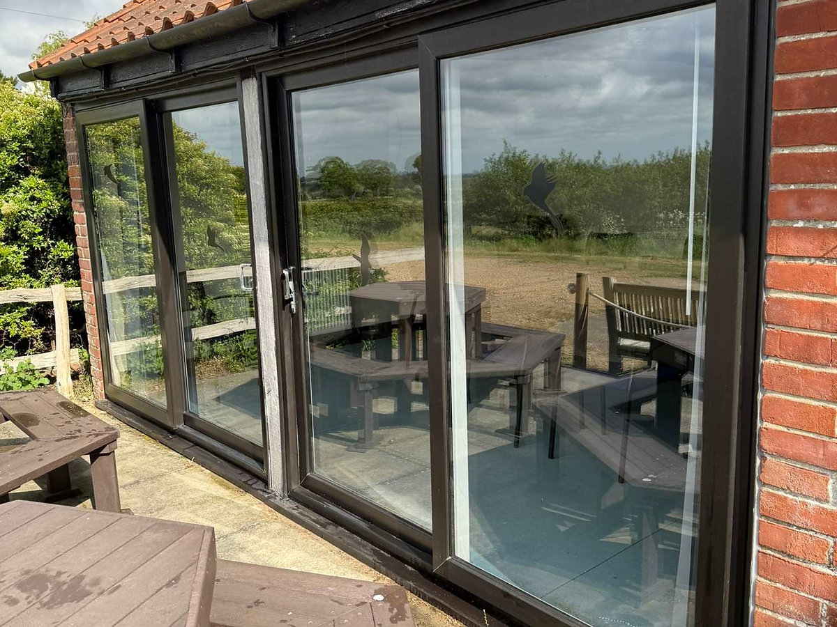 Clean sliding glass doors with clear reflections